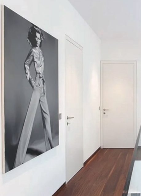 Photo on wall and two doors